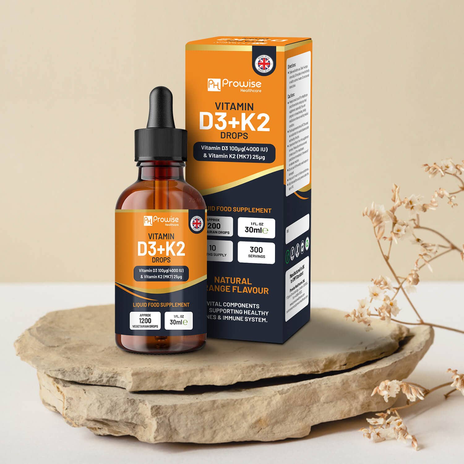 Vitamin D3+K2 drops bottle and box on natural stone surface