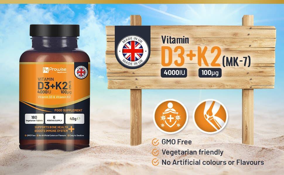 a bottle of vitamin d3 + k2 next to a sign